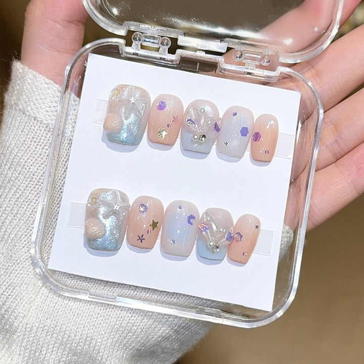 Artificial nails with sparkling galaxy design Stornfield