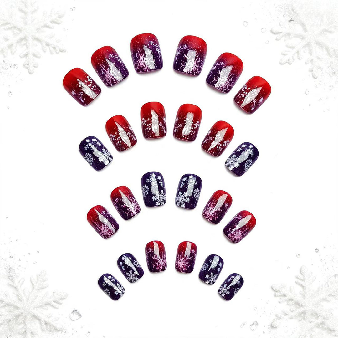 Artificial nails with festive glitter effect and wintry snow motif Stornfield