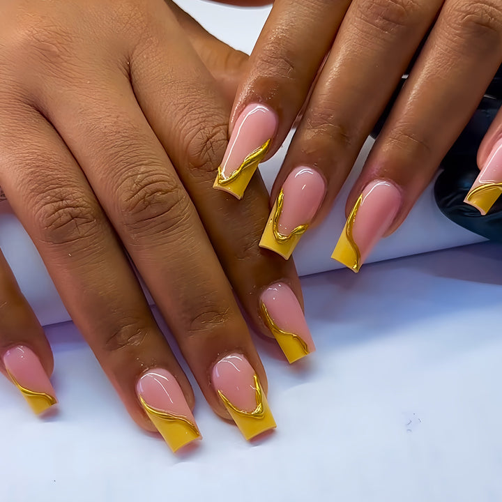 Elegant Acrylic French Tip Press-On Nails with Gold Detailing Stornfield