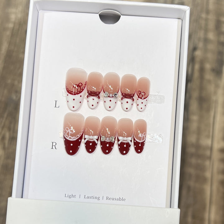 Elegant Reusable Press-On Nails with Artistic Details Stornfield