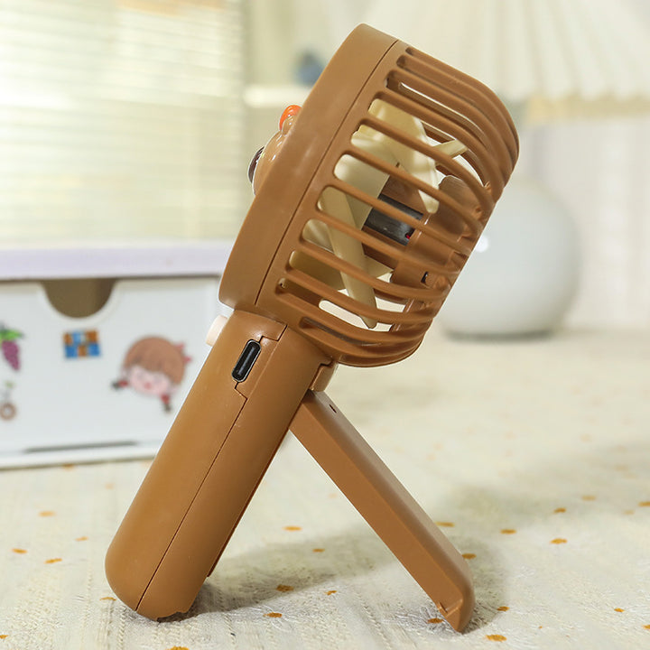 Unisex portable hand fan with bear motif and charging station Stornfield
