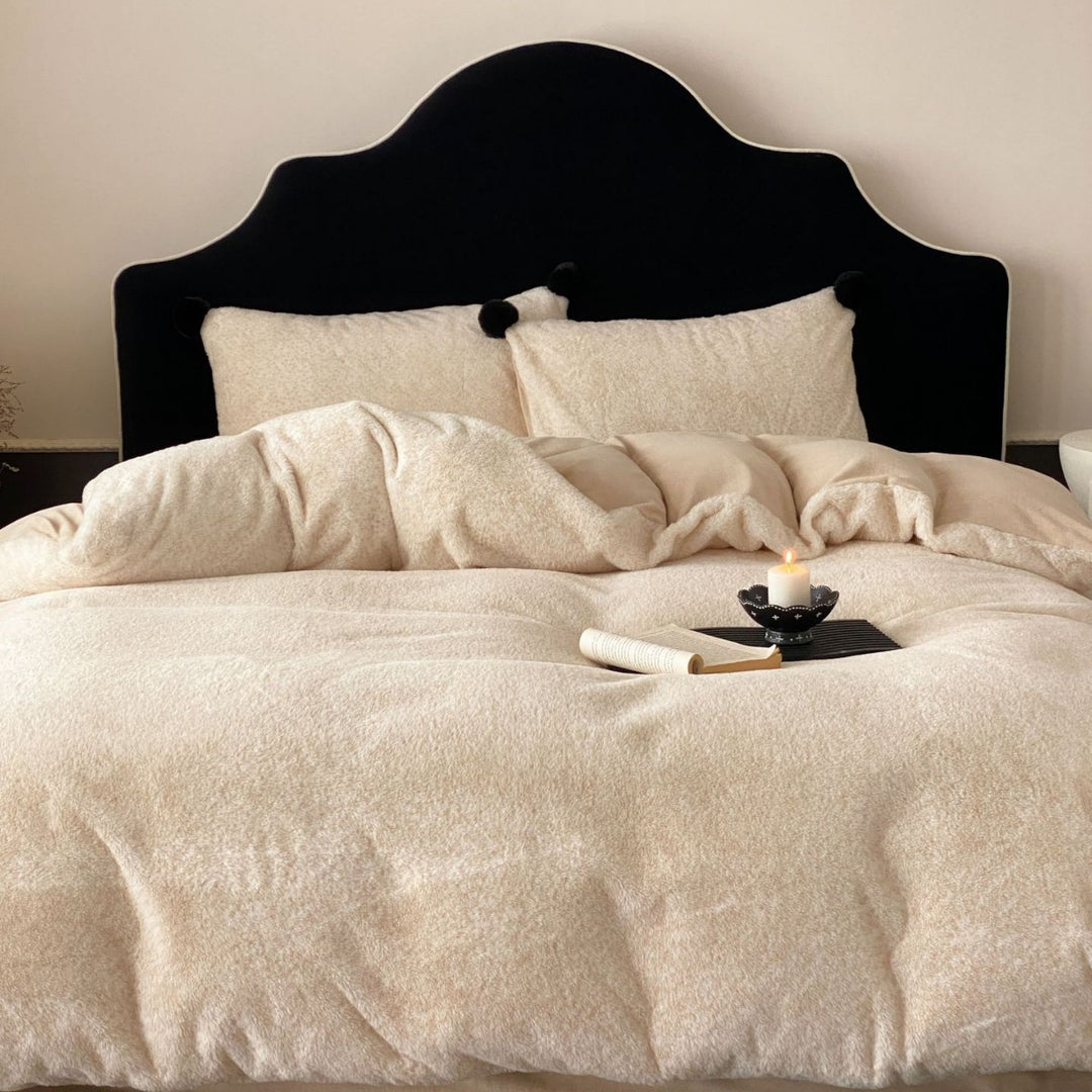 Bedding set made of soft cotton blend with decorative pom poms and reversible back