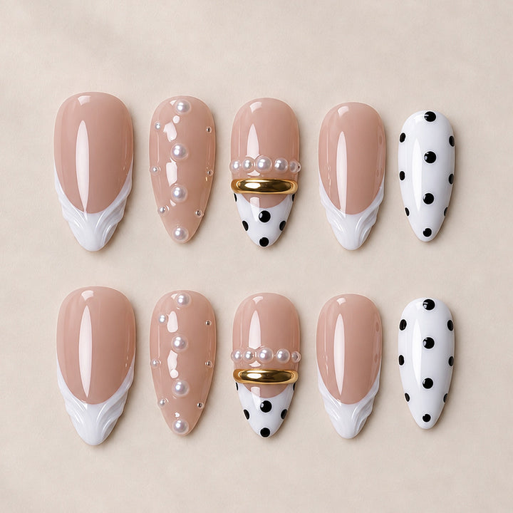 Artificial artificial nails with fashionable dots and embellishments Stornfield