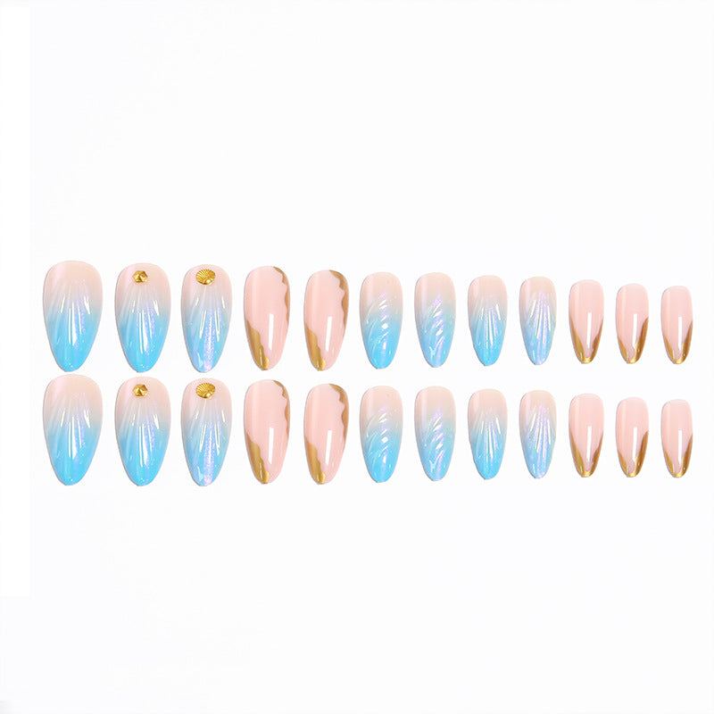 Artificial nails with elegant gradient and golden accents Stornfield