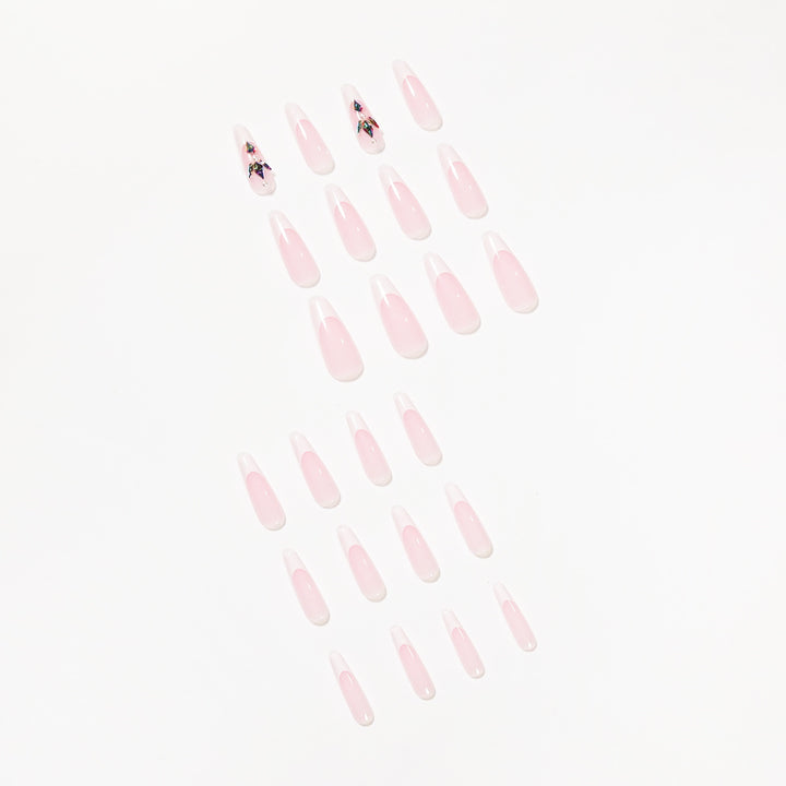 Premium Nail Extensions with Elegant Designs and Glitter Accents Stornfield