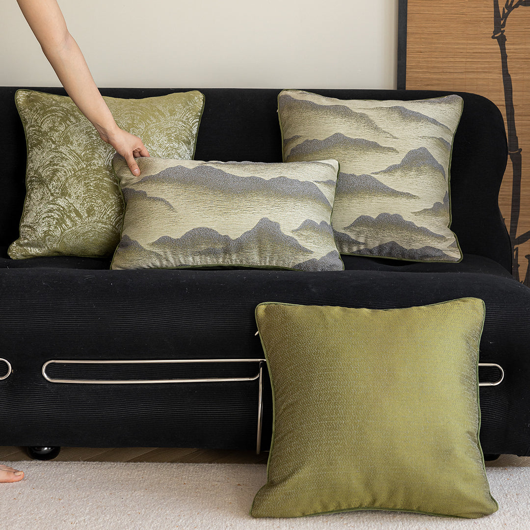 Elegant decorative pillow with elaborate mountain motif