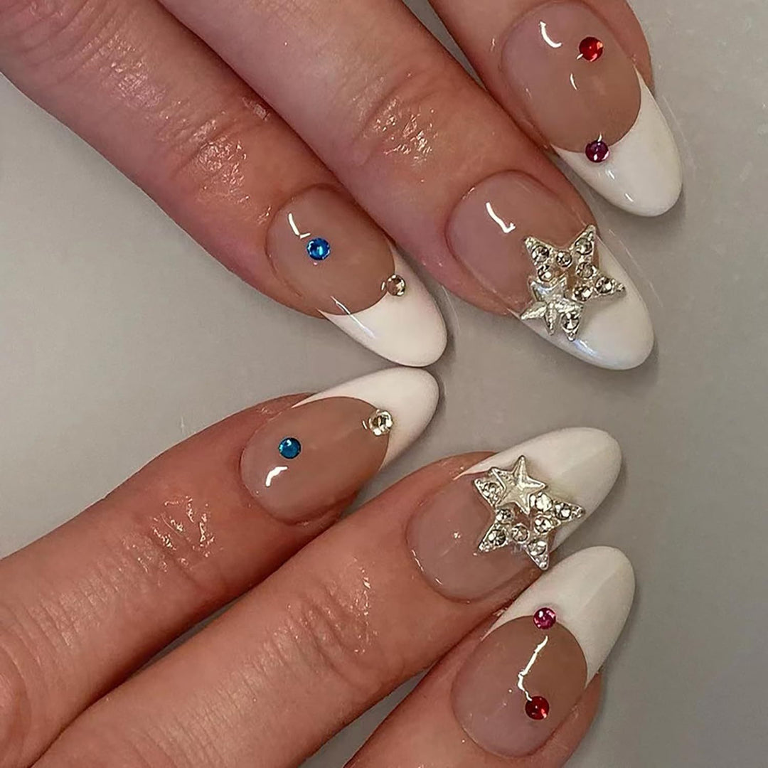 Artificial nail set with elegant French tips and sparkling accents Stornfield