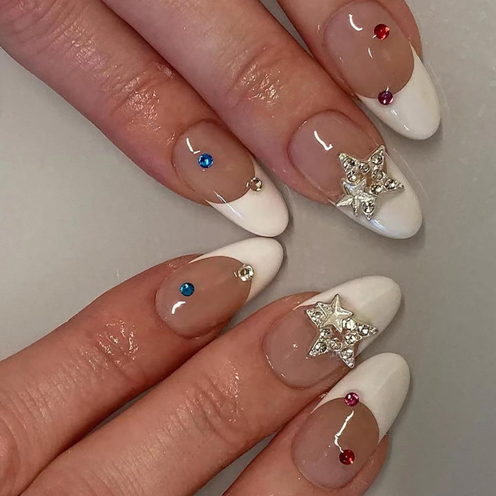 Artificial nail set with elegant French tips and sparkling accents Stornfield