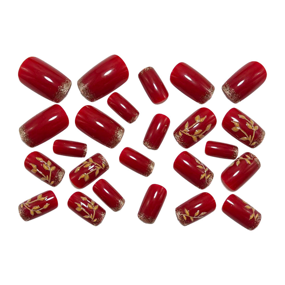 Artificial nails with golden leaf patterns Stornfield