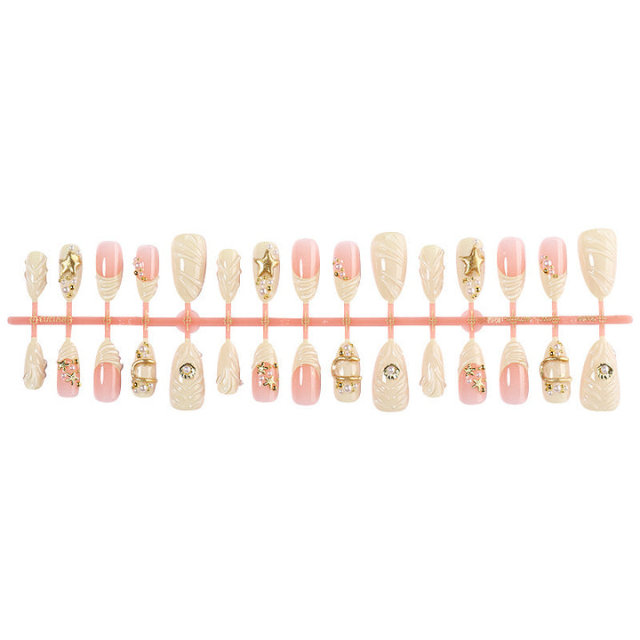 Artificial nail set with glamorous gold accents Stornfield
