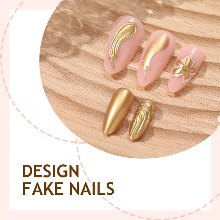 Artificial nail set with elegant golden decorations and delicate designs Stornfield