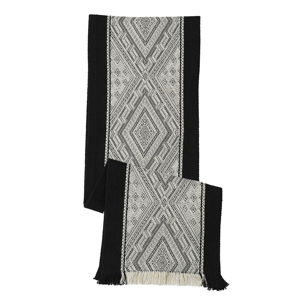 Woven table runner with geometric ethnic ornament and fringes Stornfield