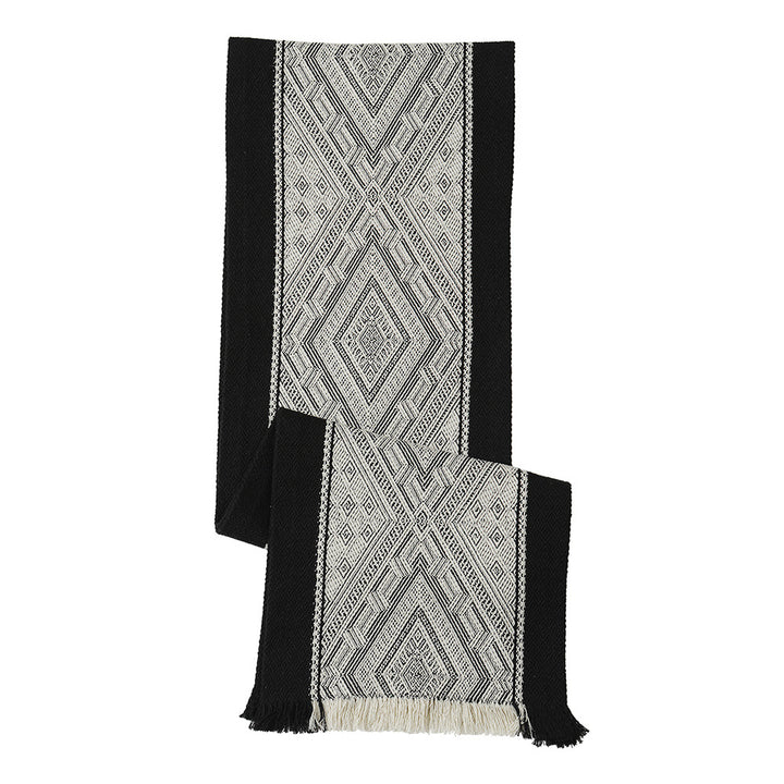 Woven table runner with geometric ethnic ornament and fringes Stornfield
