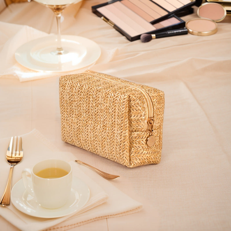 Cosmetic bag made of natural rafia material with elegant design Stornfield