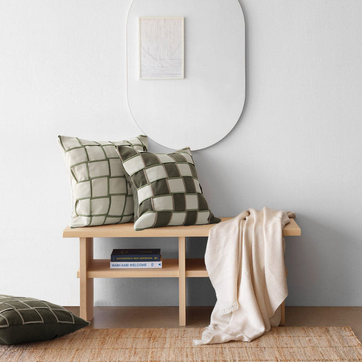 woven decorative pillow with braided square pattern