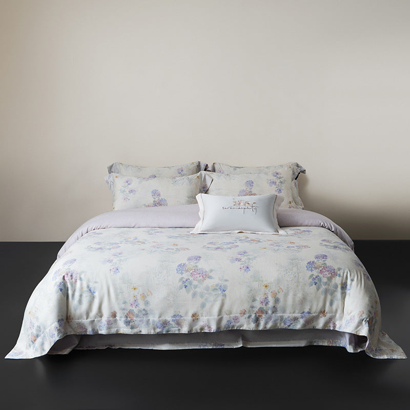 Linen-look cotton duvet cover set with delicate watercolor flower pattern and reversible function