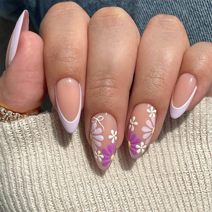 Artful nail extensions with floral accents and shine Stornfield