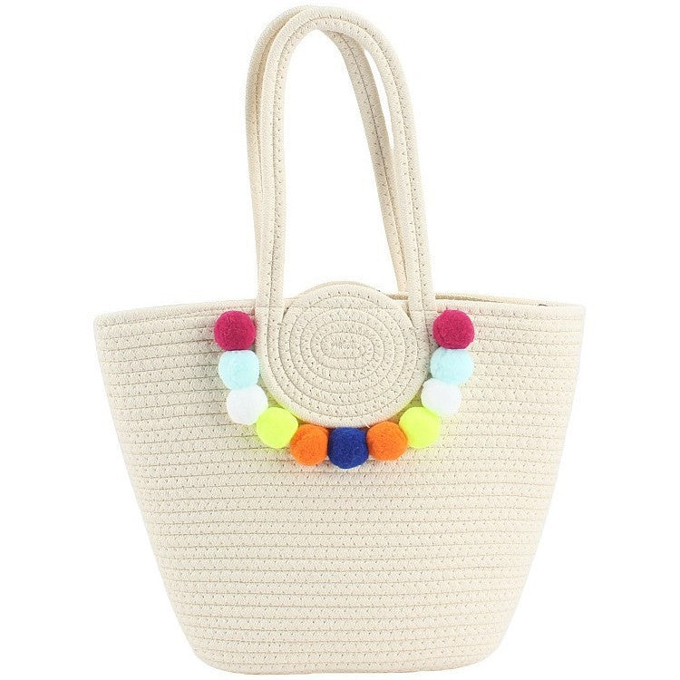 Beach bag with cheerful pom poms Stornfield