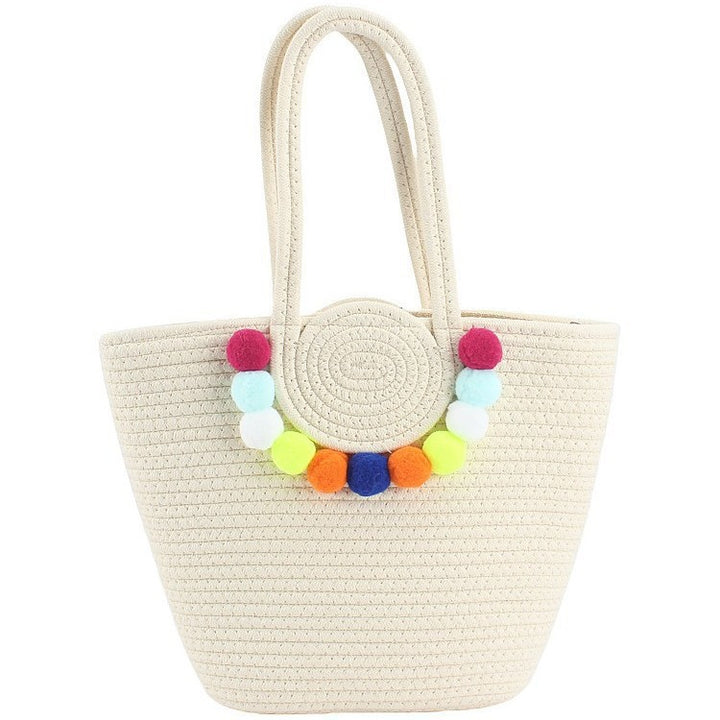 Beach bag with cheerful pom poms Stornfield
