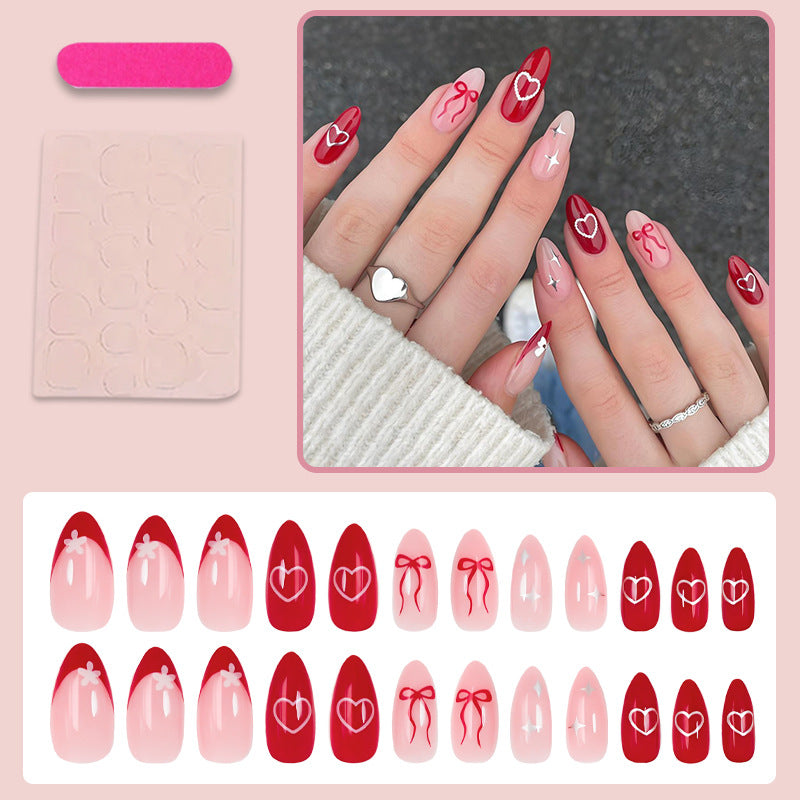 Artificial nail set with romantic hearts and bows Stornfield