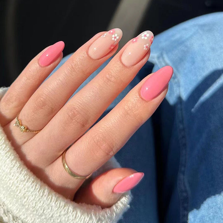 Artful nail extensions with delicate floral accents Stornfield