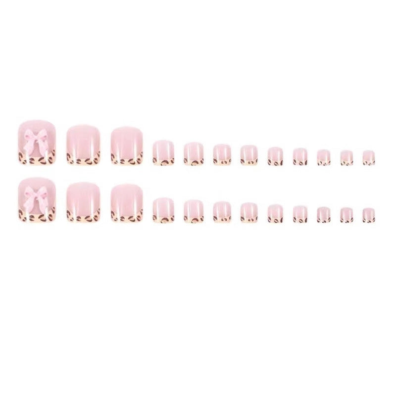 Nail art set with vibrant bow design and trendy leopard pattern Stornfield