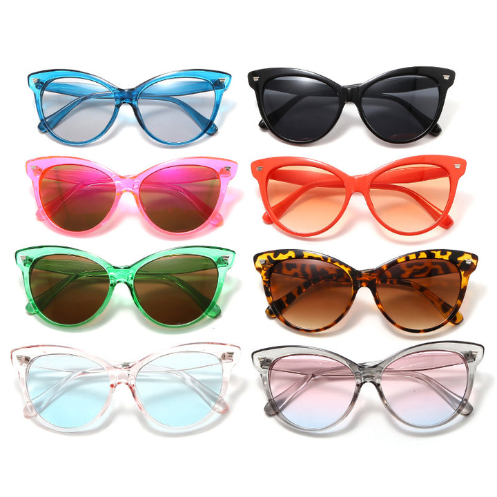 Ladies trendy cat-eye sunglasses with transparent frame and blue lenses Stornfield