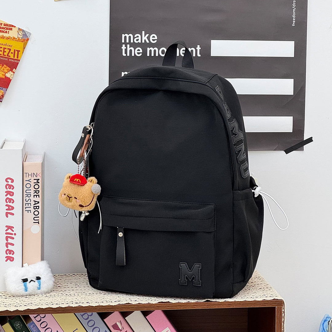 Stylish Canvas Backpack with Plush Keychain Stornfield