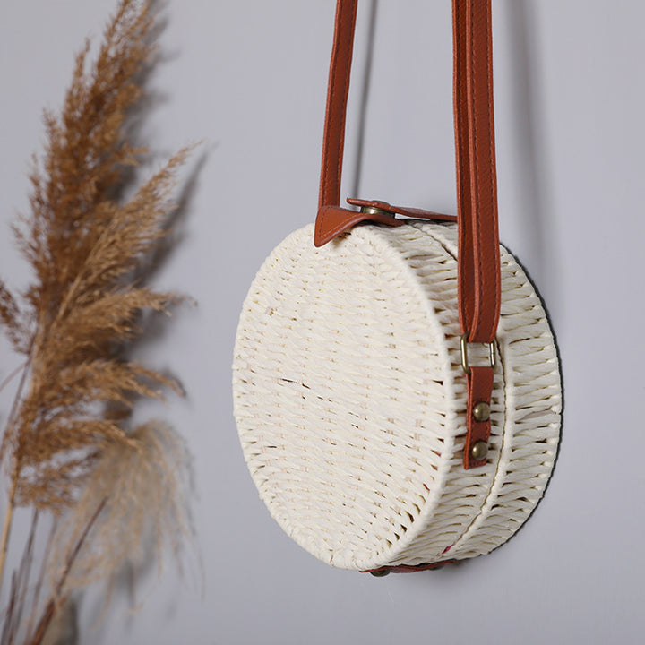 Round basket bag with leather accents Stornfield