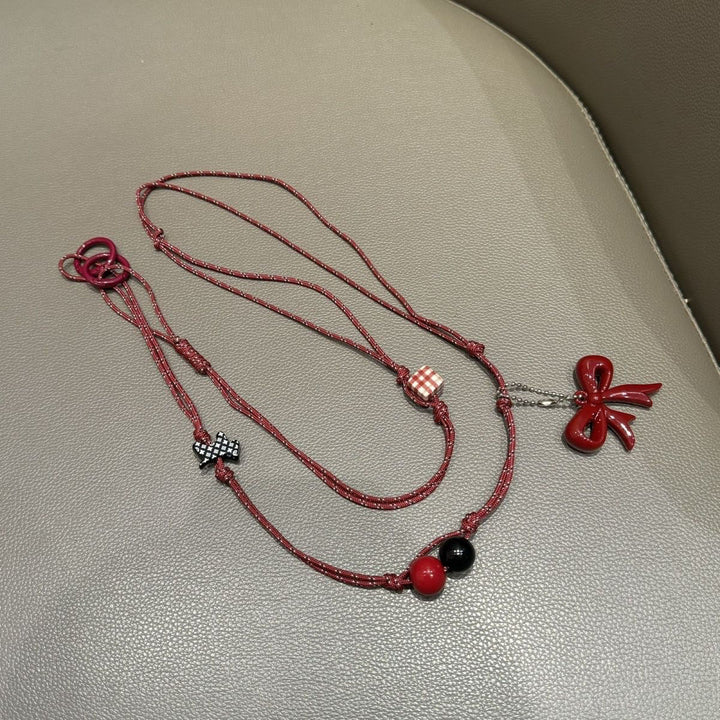 Playful Bead Charm Eyewear Holder Stornfield