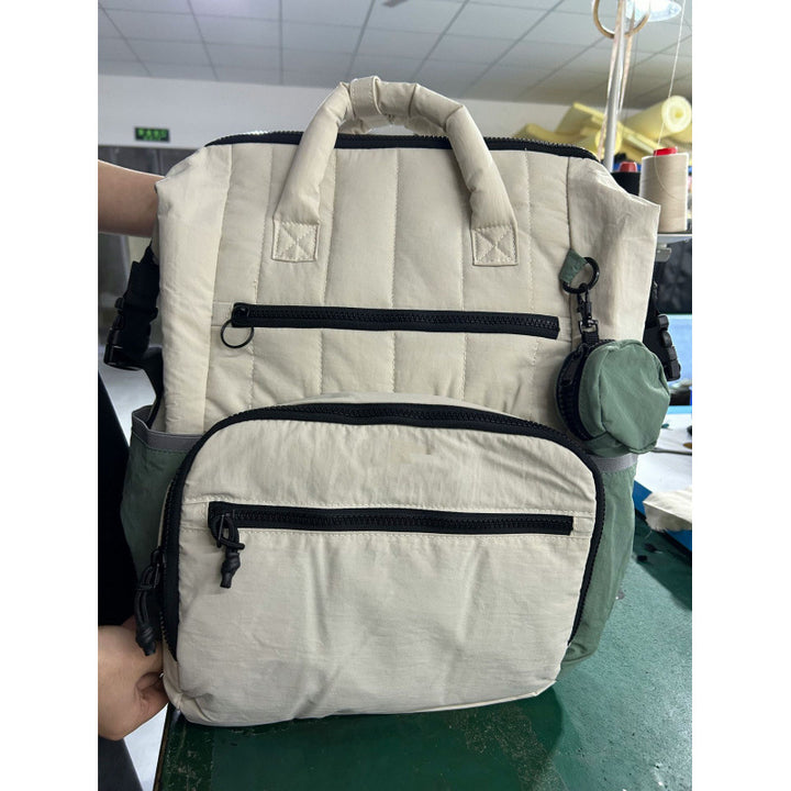 Multifunctional backpack with padded carrying handles and multiple compartments Stornfield