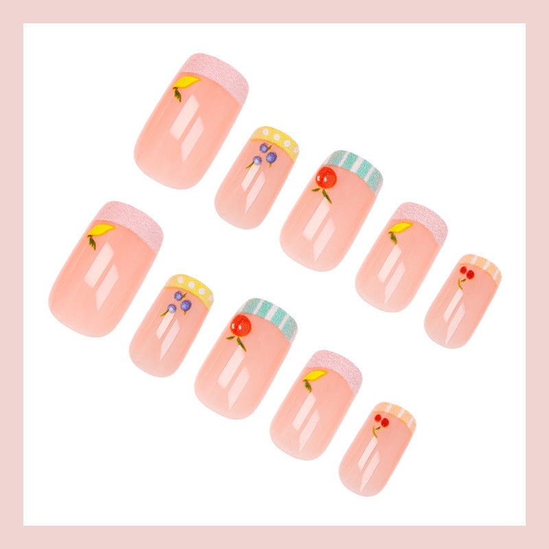 Nail art set with cheerful fruit designs and colorful accents Stornfield