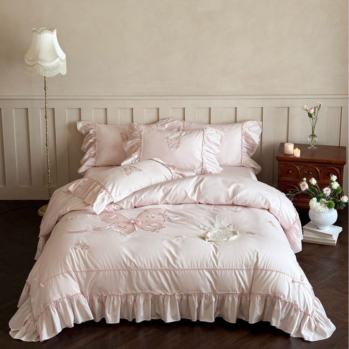 Romantic ruffled bedding set with butterfly embroidery and quilted comforter