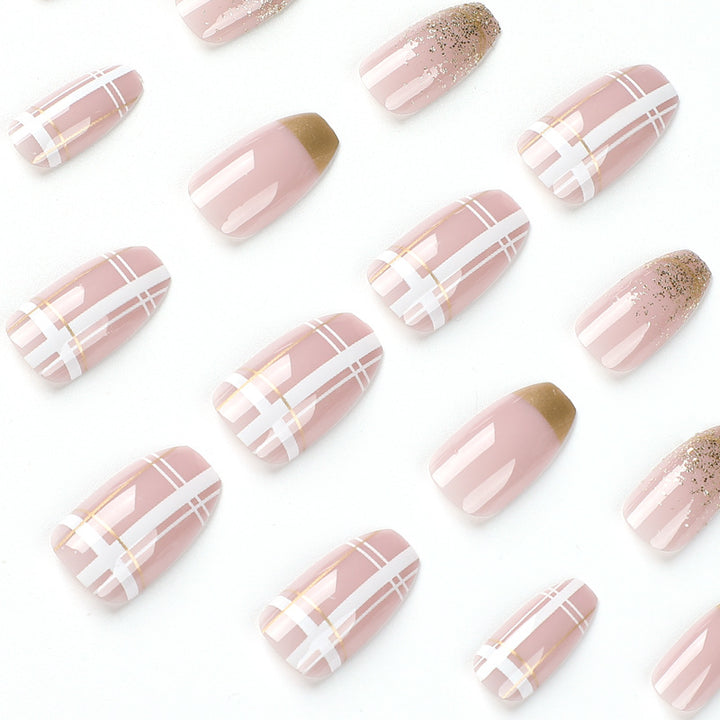 Artistic Nail Extensions with Glitter and Gold Accents Stornfield