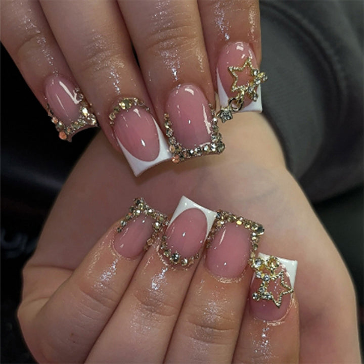 False nail set with glitter accents and holiday design Stornfield