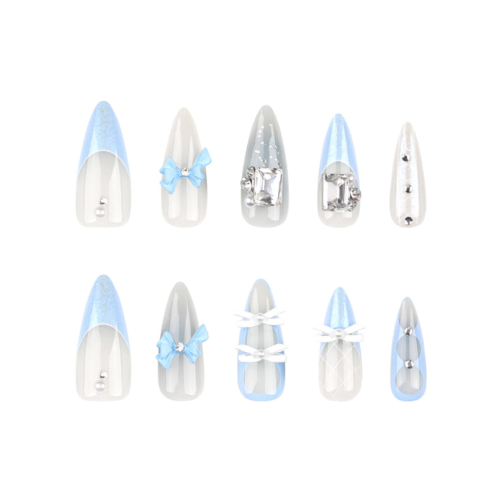 Artistic stiletto nails with elegant jewelry accents Stornfield