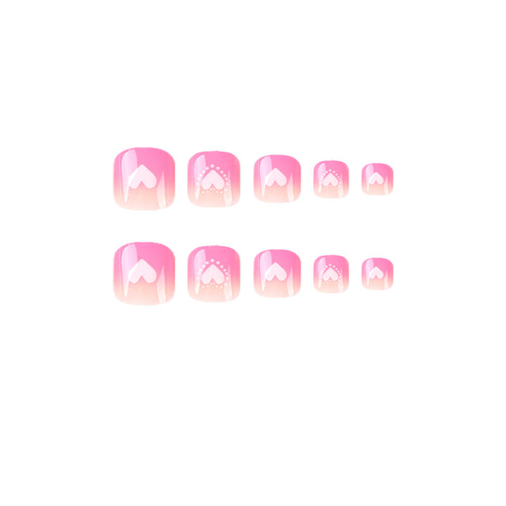 Artful toenail design with heart motifs Stornfield