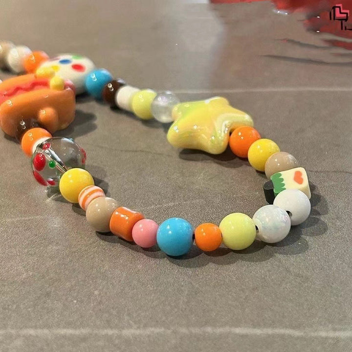 Playful Food-Themed Bead Phone Charm Stornfield