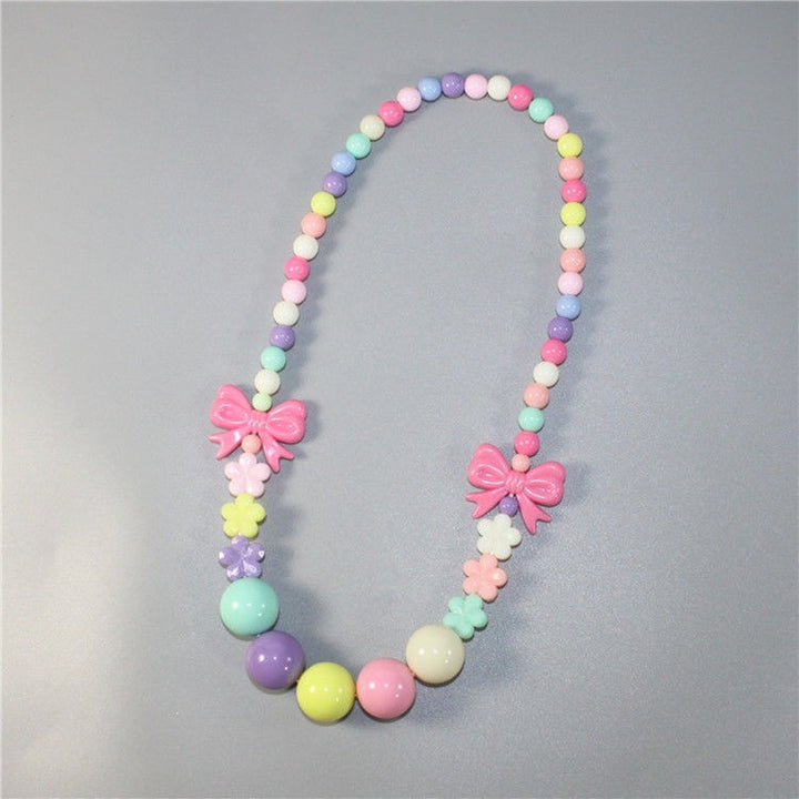 Colorful pearl necklace with floral elements Stornfield