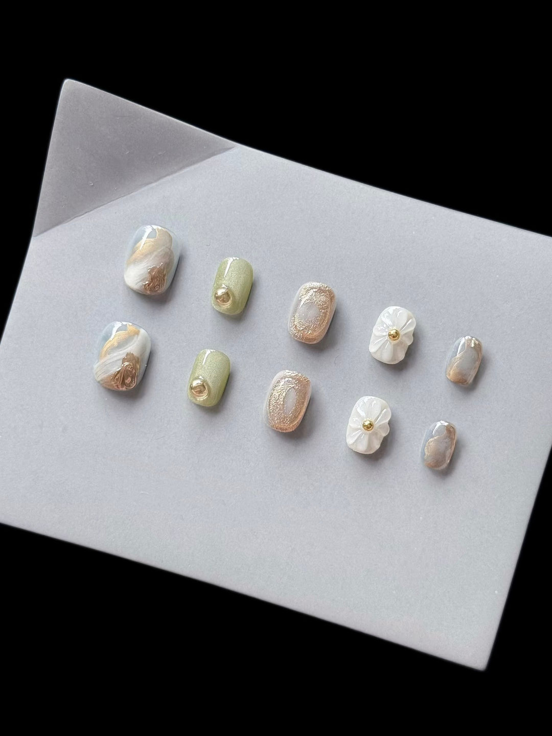 Premium Press-On Nail Art Set with Floral and Metallic Accents