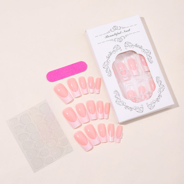 Artificial nail set with elegant manicure designs and delicate accents Stornfield
