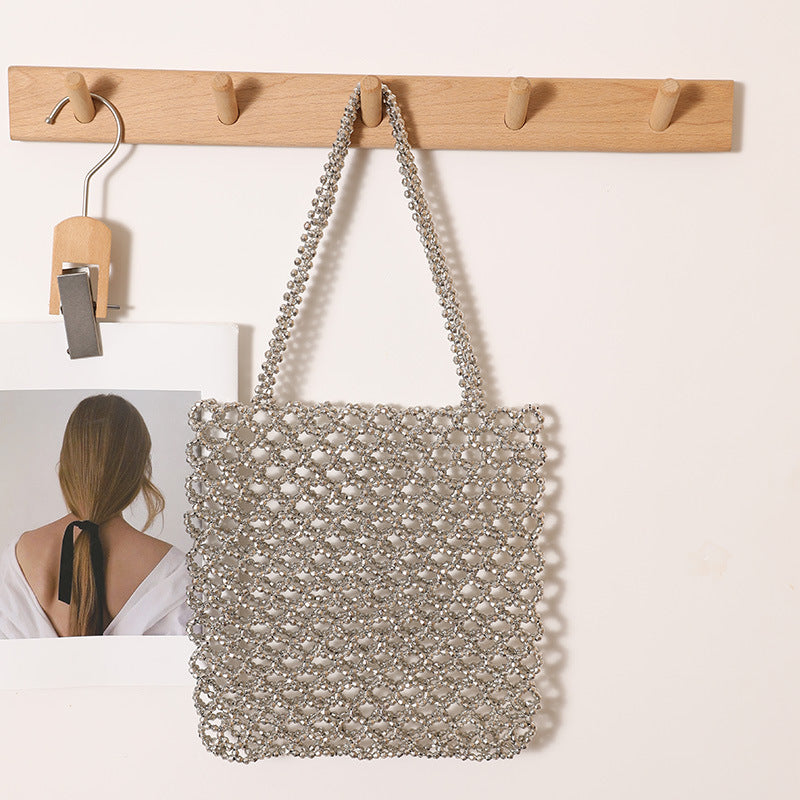 Sparkling Net Handbag Made of Braided Material Stornfield