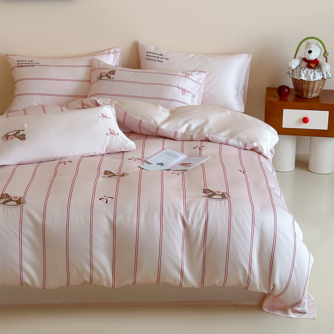 Children's bedding set with satin look, fine stripes and rocking horse appliqués