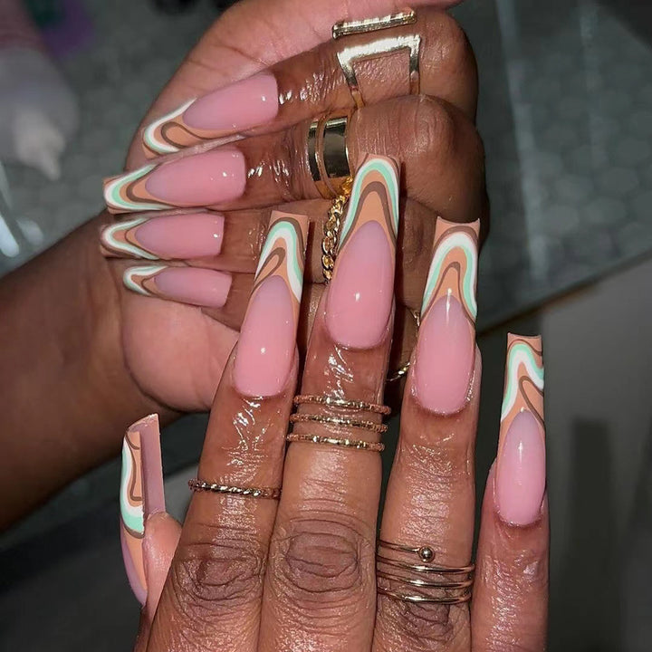 Artful acrylic nails with elegant wave design Stornfield