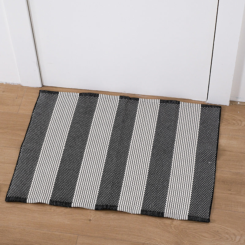 Flat striped carpet runner made of cotton blend with anti-slip coating and easy-care woven structure