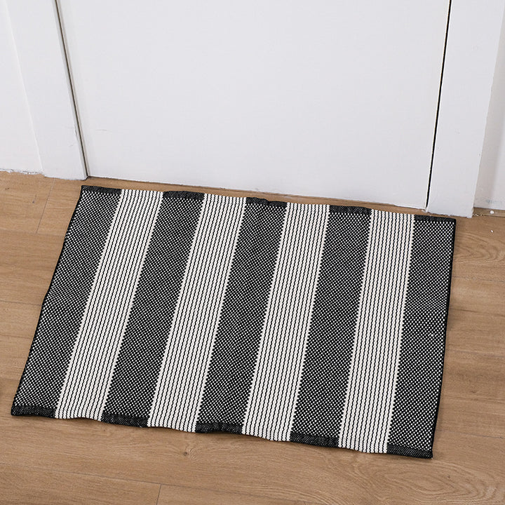 Flat striped carpet runner made of cotton blend with anti-slip coating and easy-care woven structure