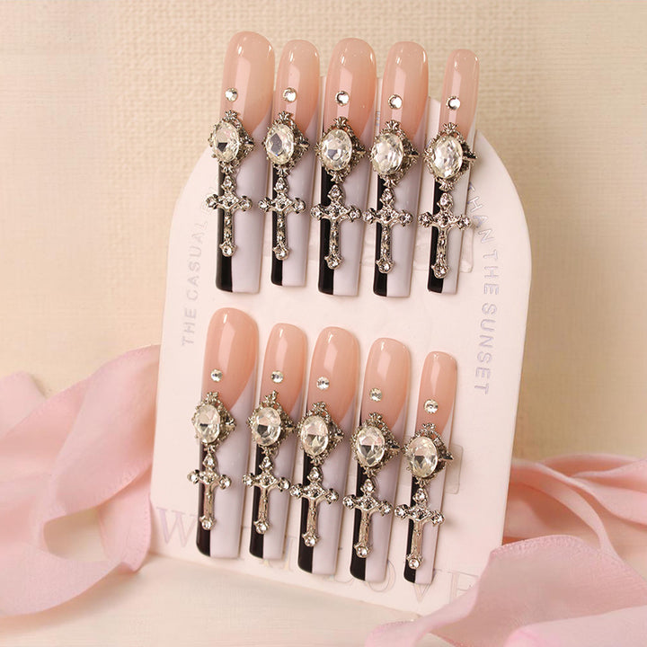 Glamorous artificial nails with elegant cross decorations Stornfield