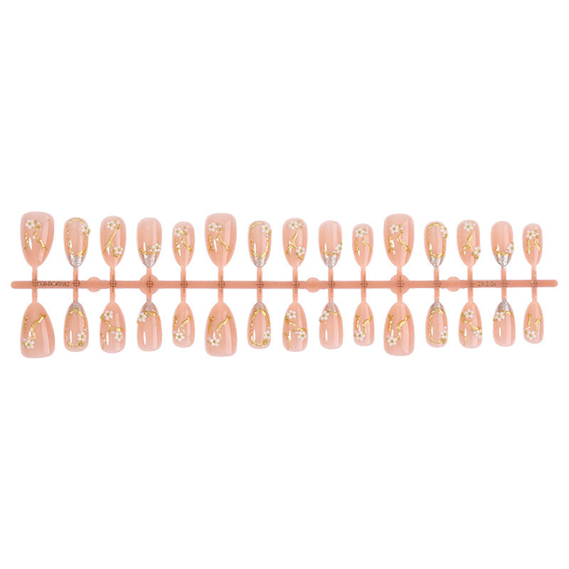 Creative nail art set with delicate flower decoration and glitter elements Stornfield
