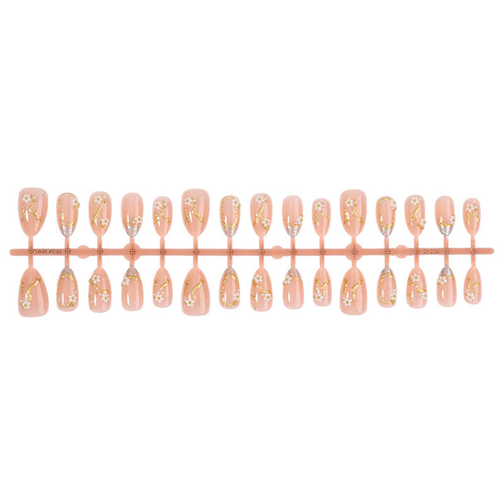 Creative nail art set with delicate flower decoration and glitter elements Stornfield