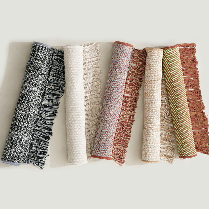 Woven table runner with dense herringbone jacquard and fringes Stornfield
